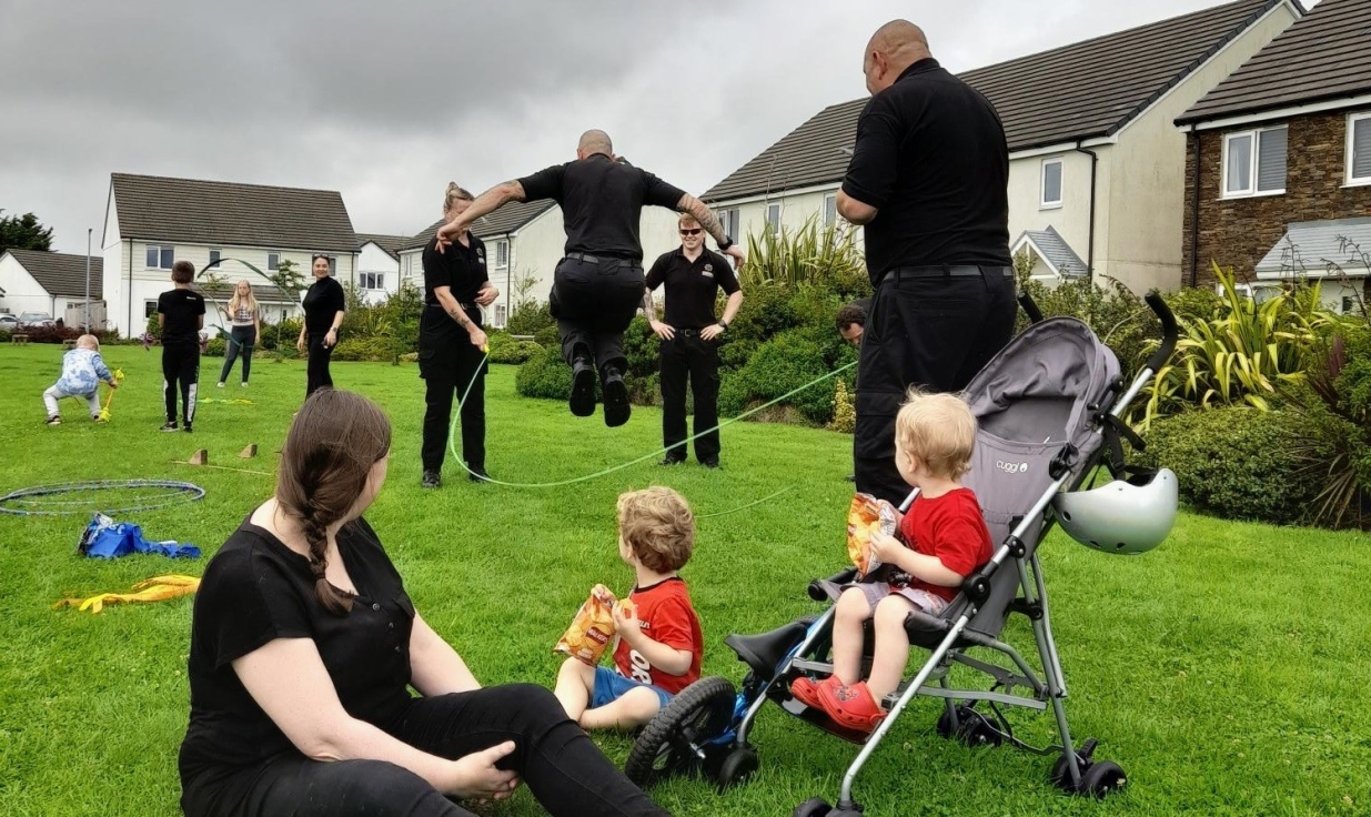 Local firefighters using a skipping rope at our community event.