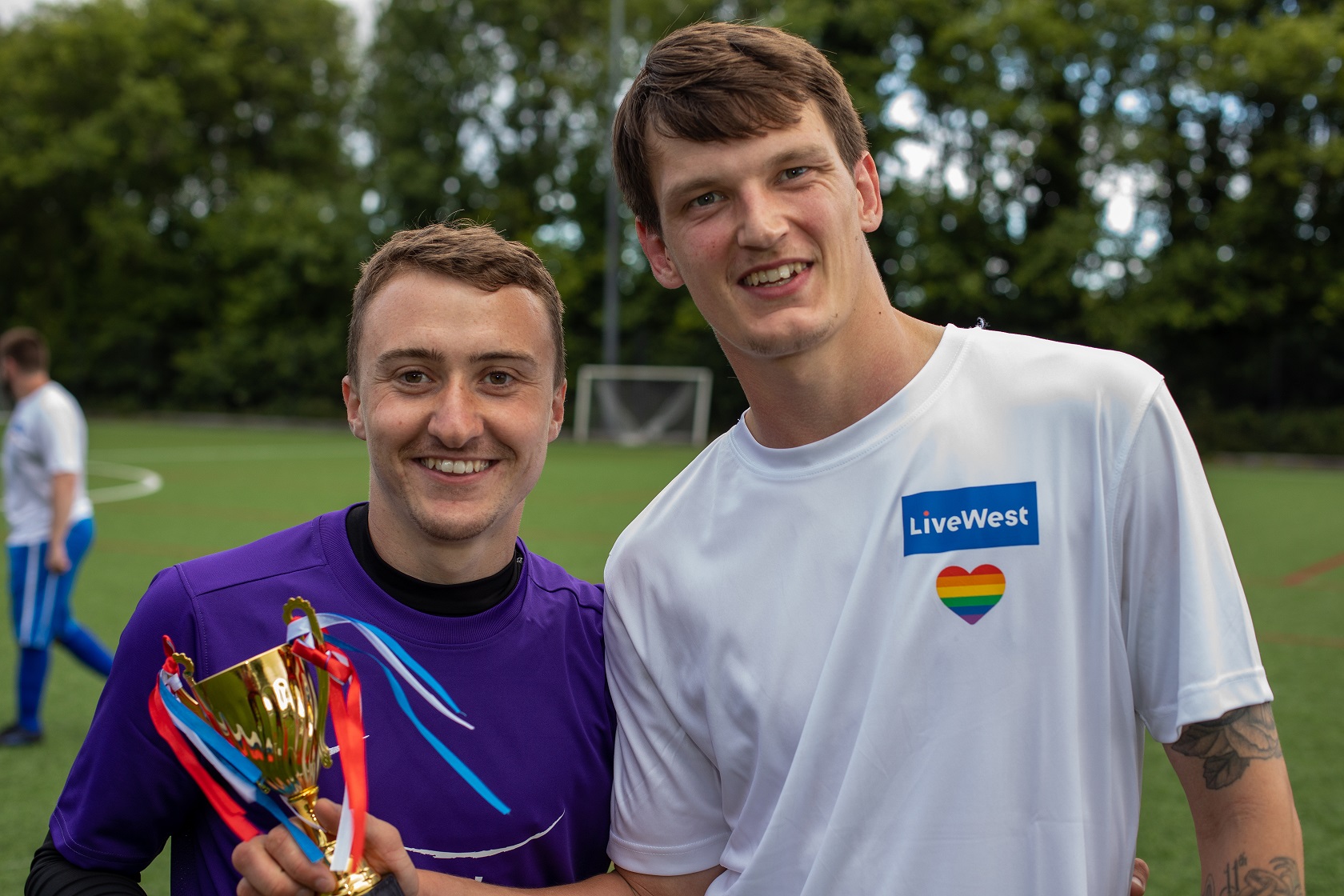 Two players at charity football match