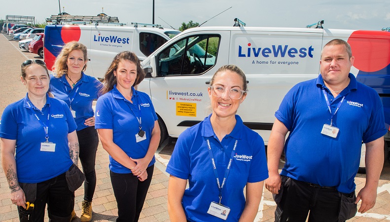 several tradeswomen and a tradesman