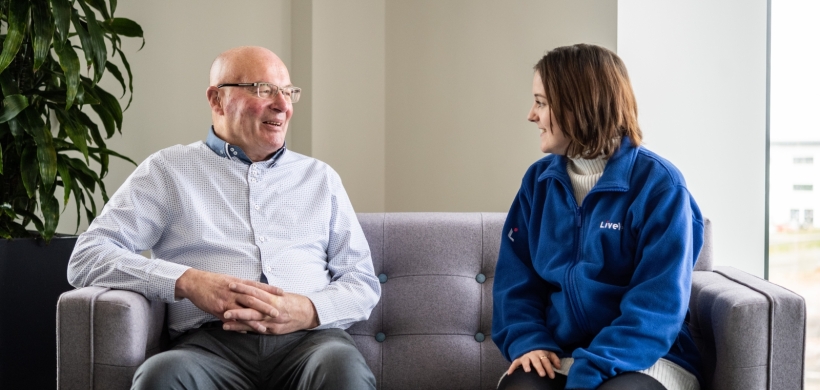 Our Vice Chair of InFocus (left) smiling next to one of our colleagues.