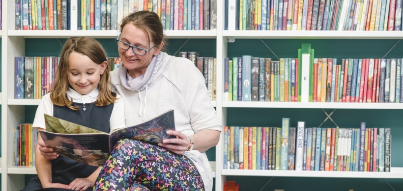 Sue and her daughter Olivia at St Budeaux's community library.