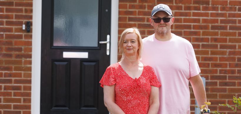 Cressie and Richard outside their new home in Somerton.