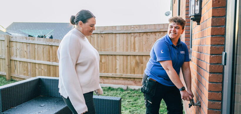 Georgia doing an outside repair with a resident