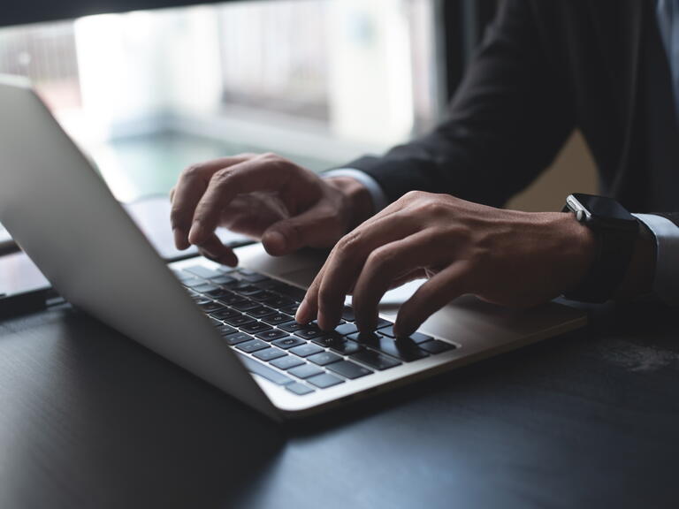 person using laptop
