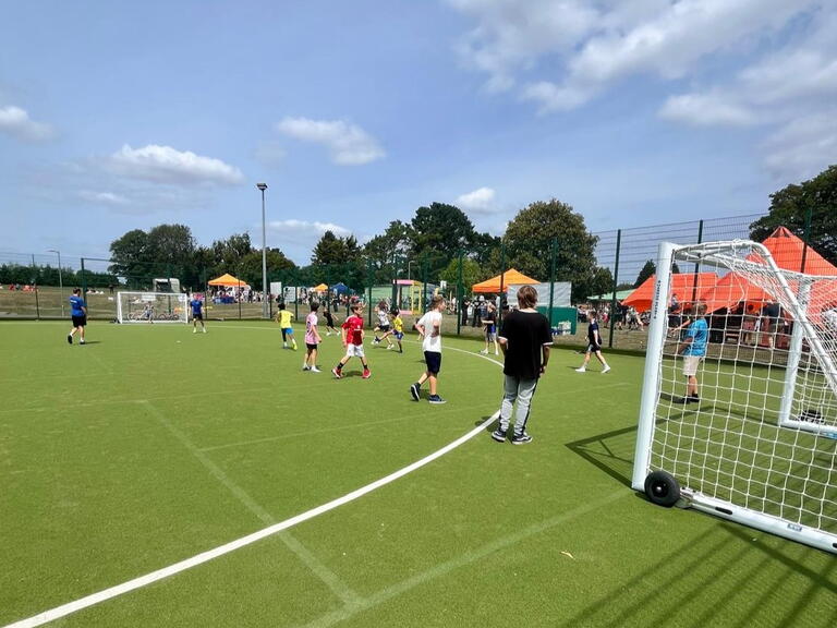 A group of young people playing football as part in our free activity sessions. 