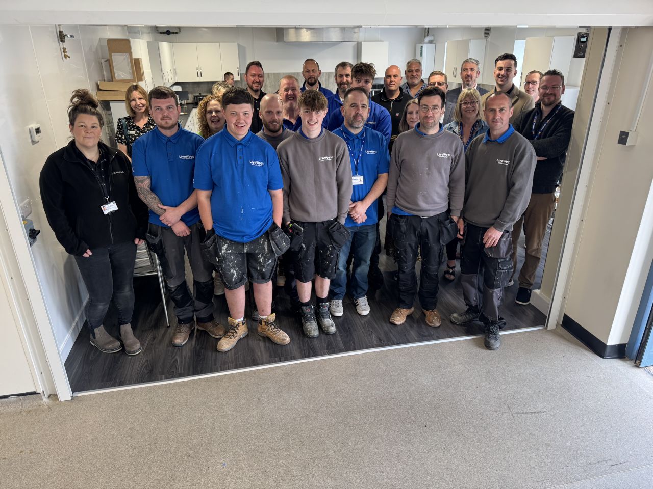 LiveWest apprentices involved in the new kitchen at Torbay Foyer.