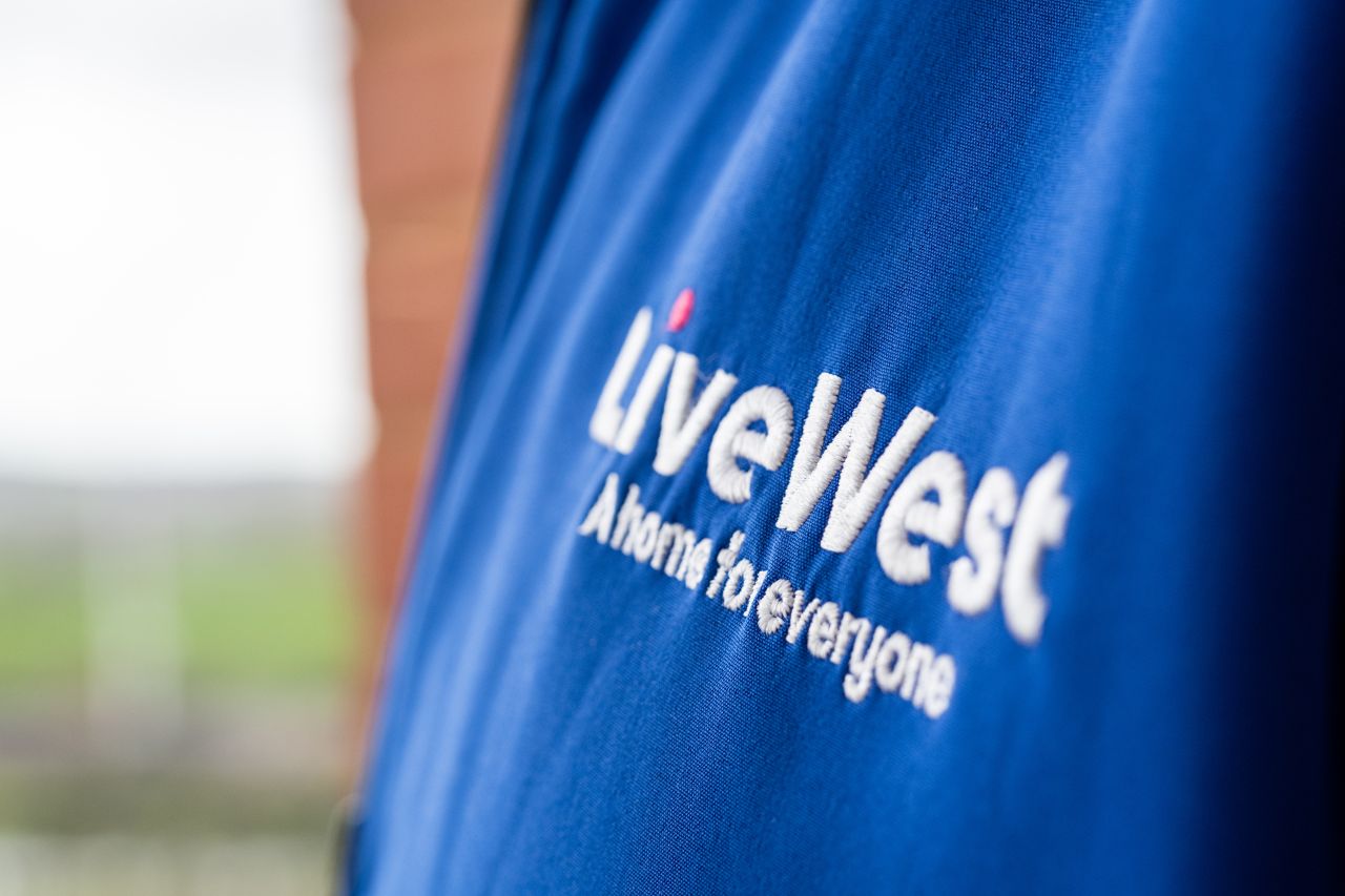LiveWest logo on a coat.