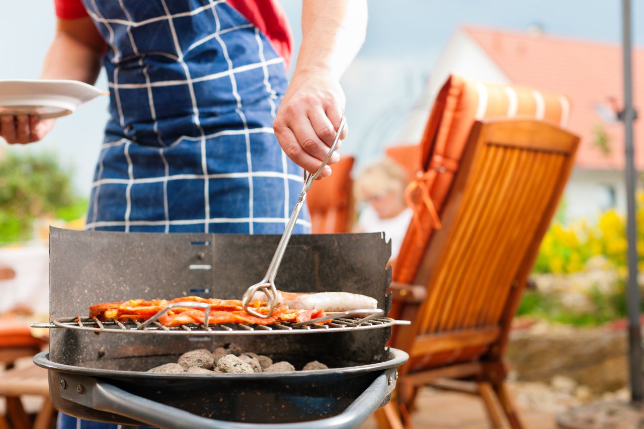 Someone using a barbecue. Image: Shutterstock/Kzenon