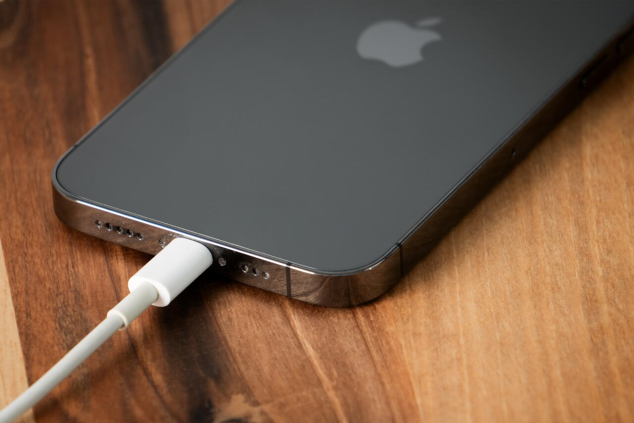 Image shows an iPhone on charge