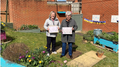 Vyv and Kate at the community garden