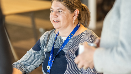 LiveWest colleague in a blue sunflower lanyard