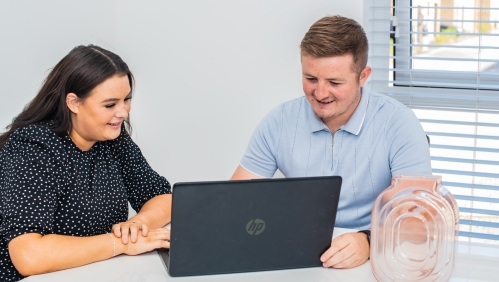 Customers using a laptop