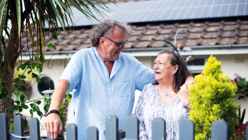 Peter and Anita outside their home in Devon.