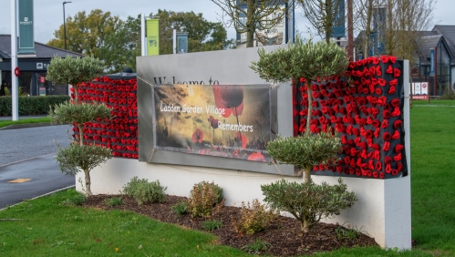 The crochet poppy wall at Ladden Garden Village