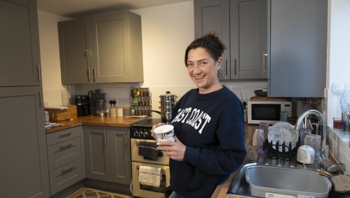 Mary in her kitchen in the new build home in Congresbury.