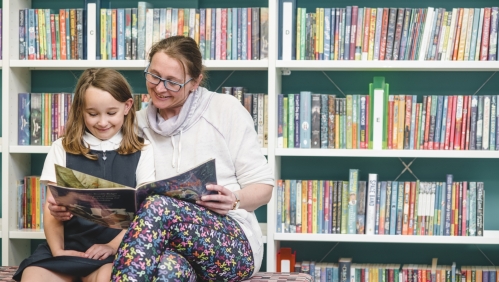 Sue and her daughter Olivia at St Budeaux's community library.