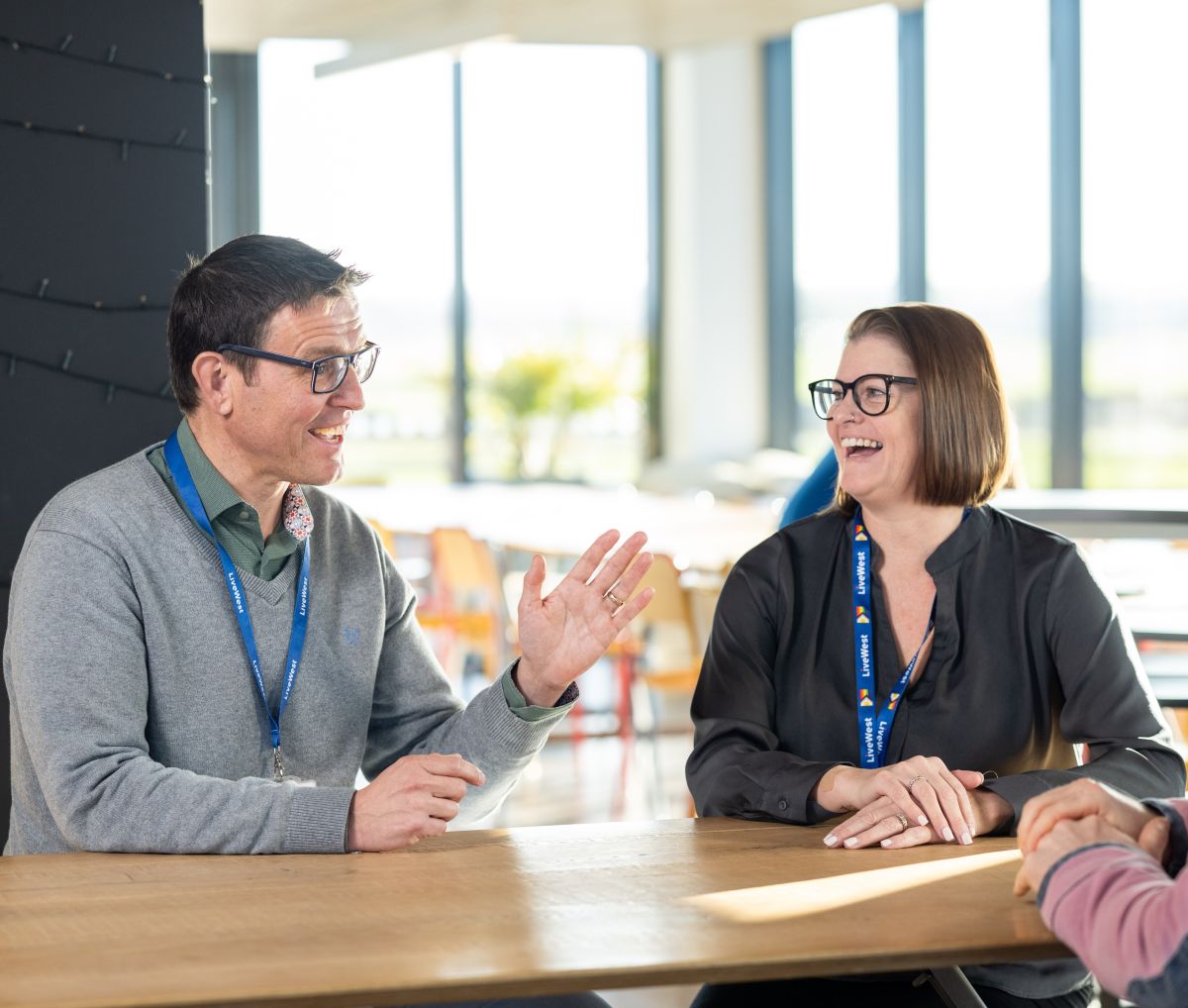 Paul Turner laughing with colleagues