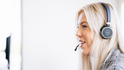 Image of a LiveWest colleague speaking to someone on a headset.